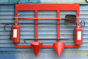 Fire shield on the wall. set primary fire extinguishing equipment ...