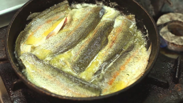 Frying Fish Stock Footage: Royalty-Free Video Clips - Storyblocks