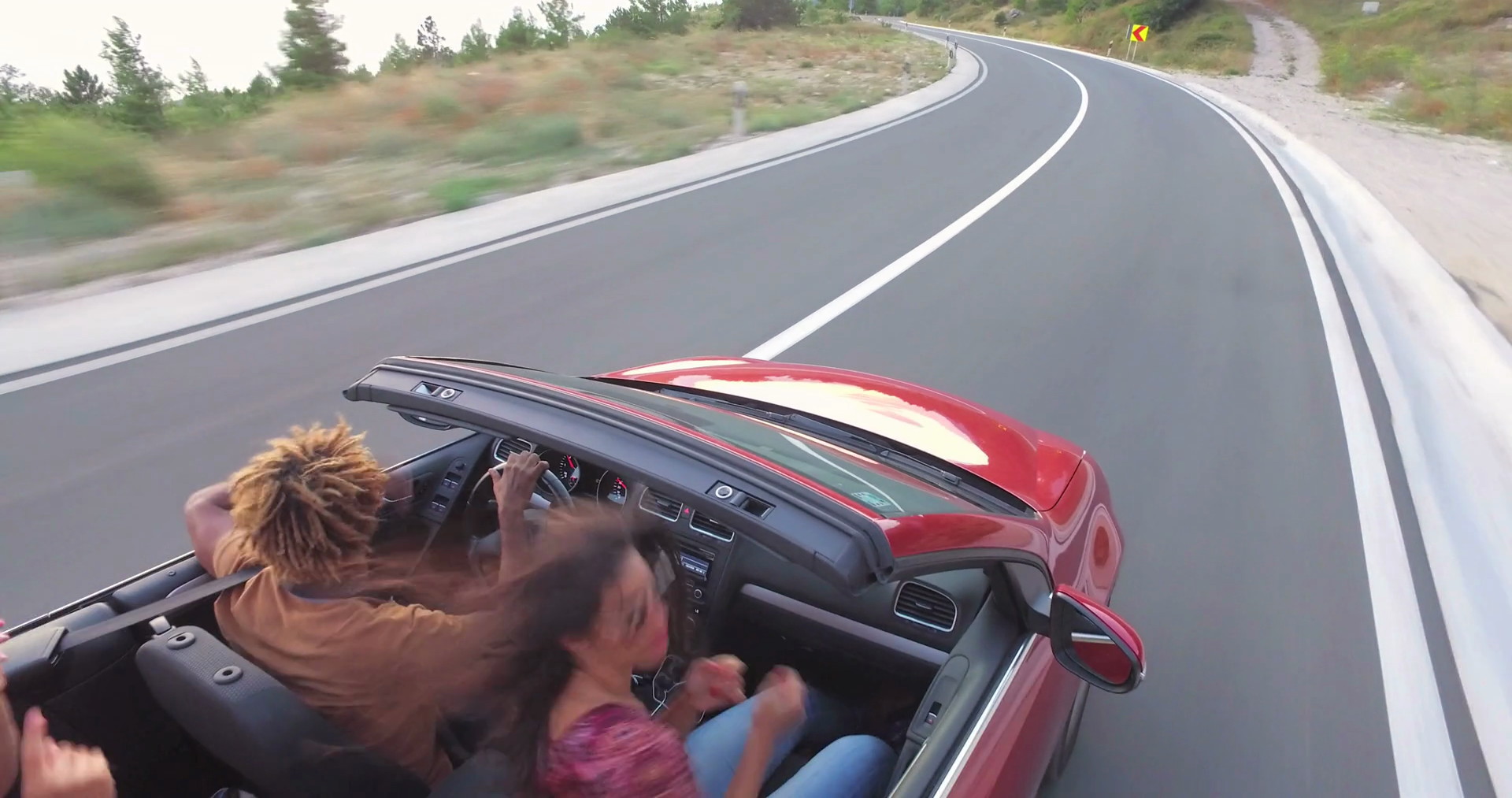 Friends Having Fun Road Trip In Convertible Stock Footage SBV-313116400 ...