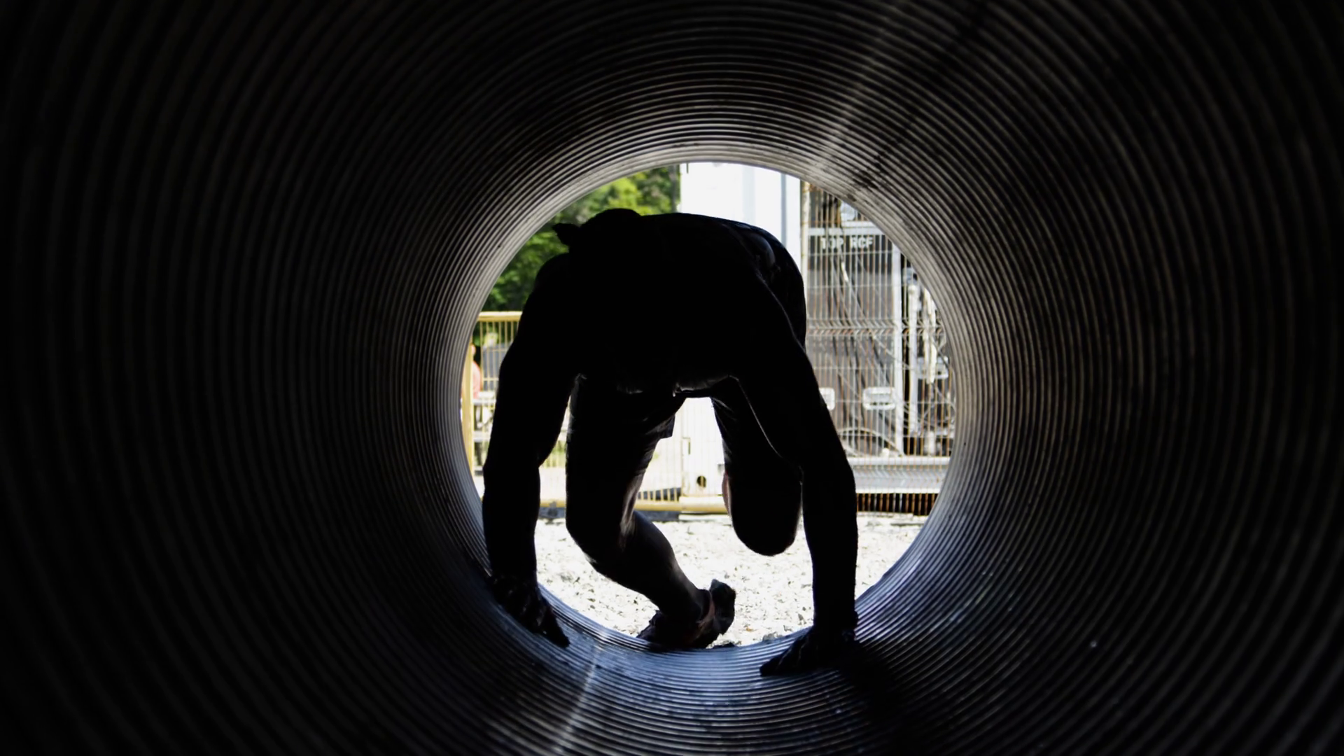 Silhouette Of Athlete Running Through Tube Stock Footage SBV-349228402 ...