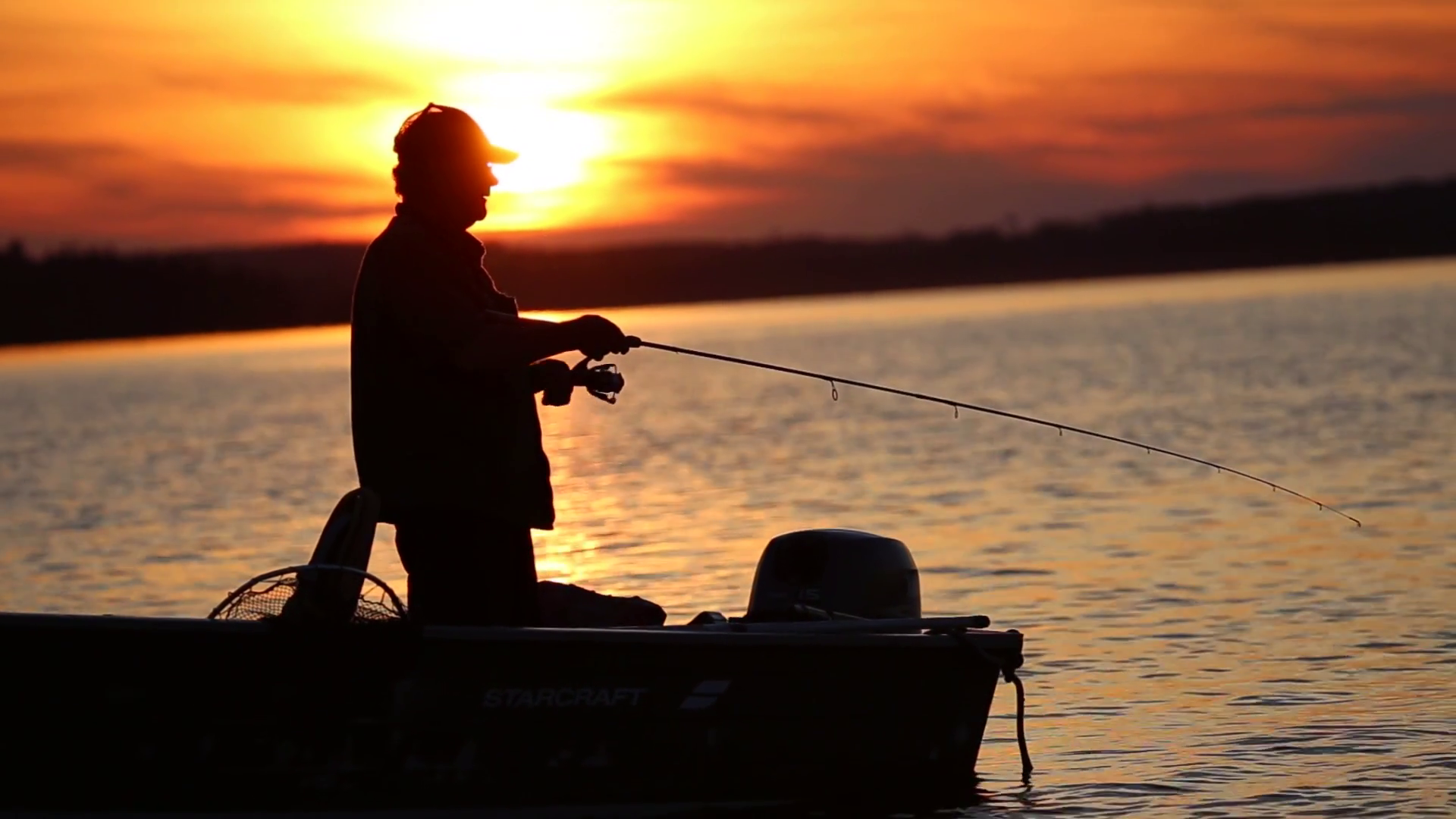 Silhouette Of Man Standing In Fishing Boat Stock Footage SBV-317970482 - Storyblocks