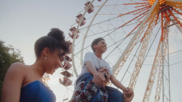 Shoulder Ride Carnival Stock Footage: Royalty-Free Video Clips ...