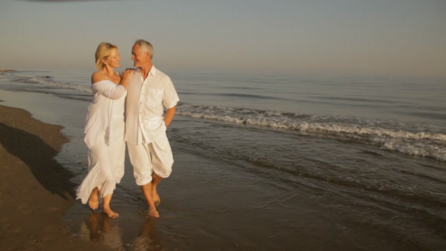 Naturist Couples On Beach Stock Footage: Royalty-Free Video Clips ...