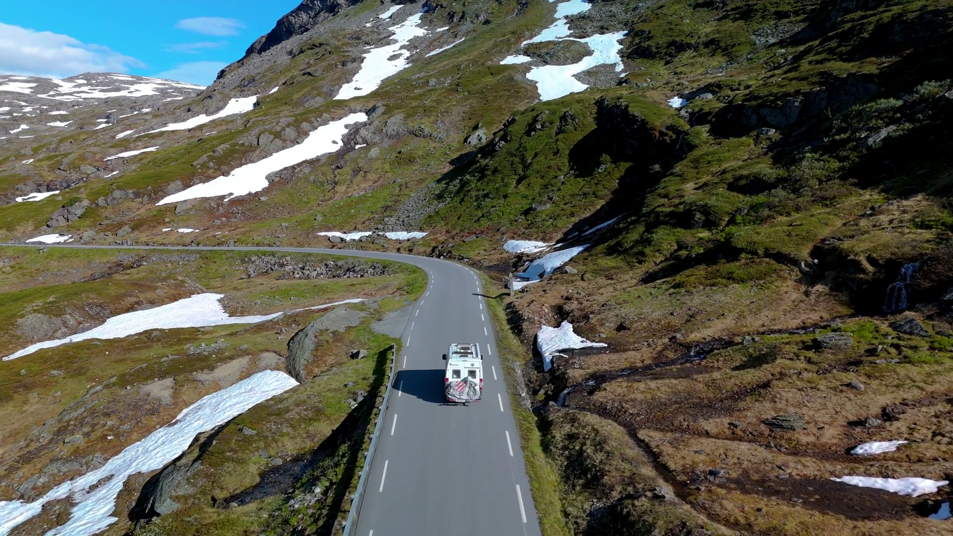 A Camper Van Travels On Scenic Mountain Road Stock Footage SBV ...