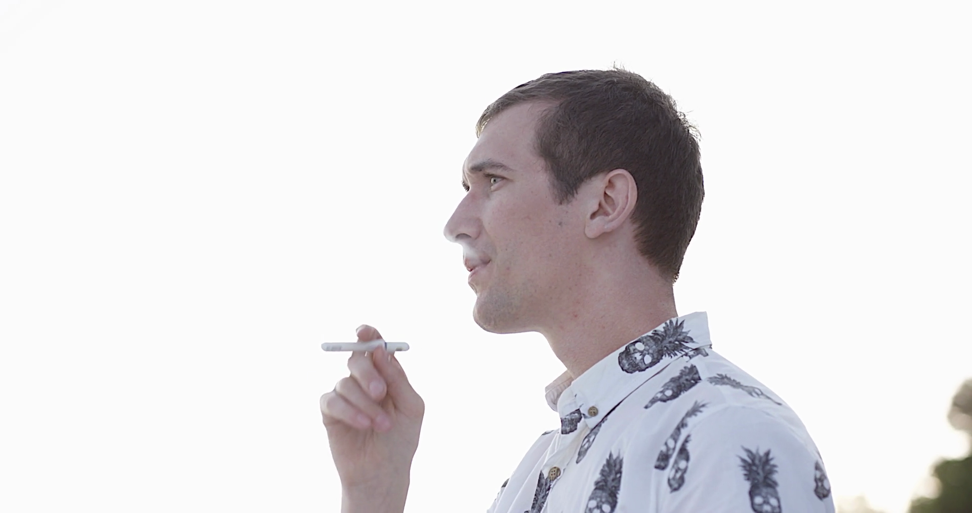 man smoking cigarette video a Outdoors During the Day Man, Smoking, Pipe, Hat