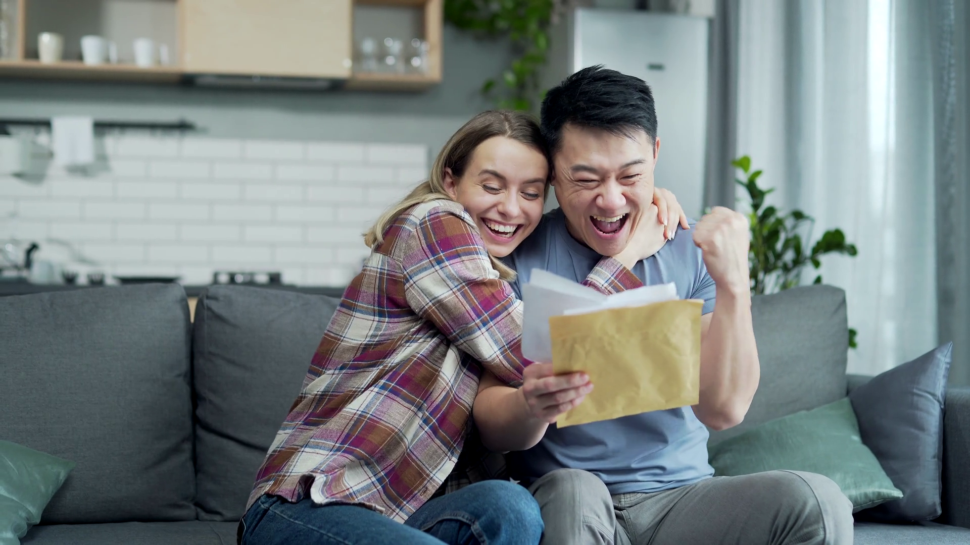 Happy Young Diverse Couple Reading Letter Stock Footage SBV-351996040 ...