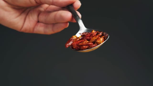 Red Chili Powder Falling Stock Footage: Royalty-Free Video Clips ...