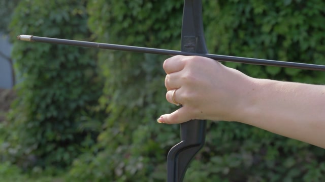 Pulling Bowstring Stock Footage: Royalty-Free Video Clips - Storyblocks