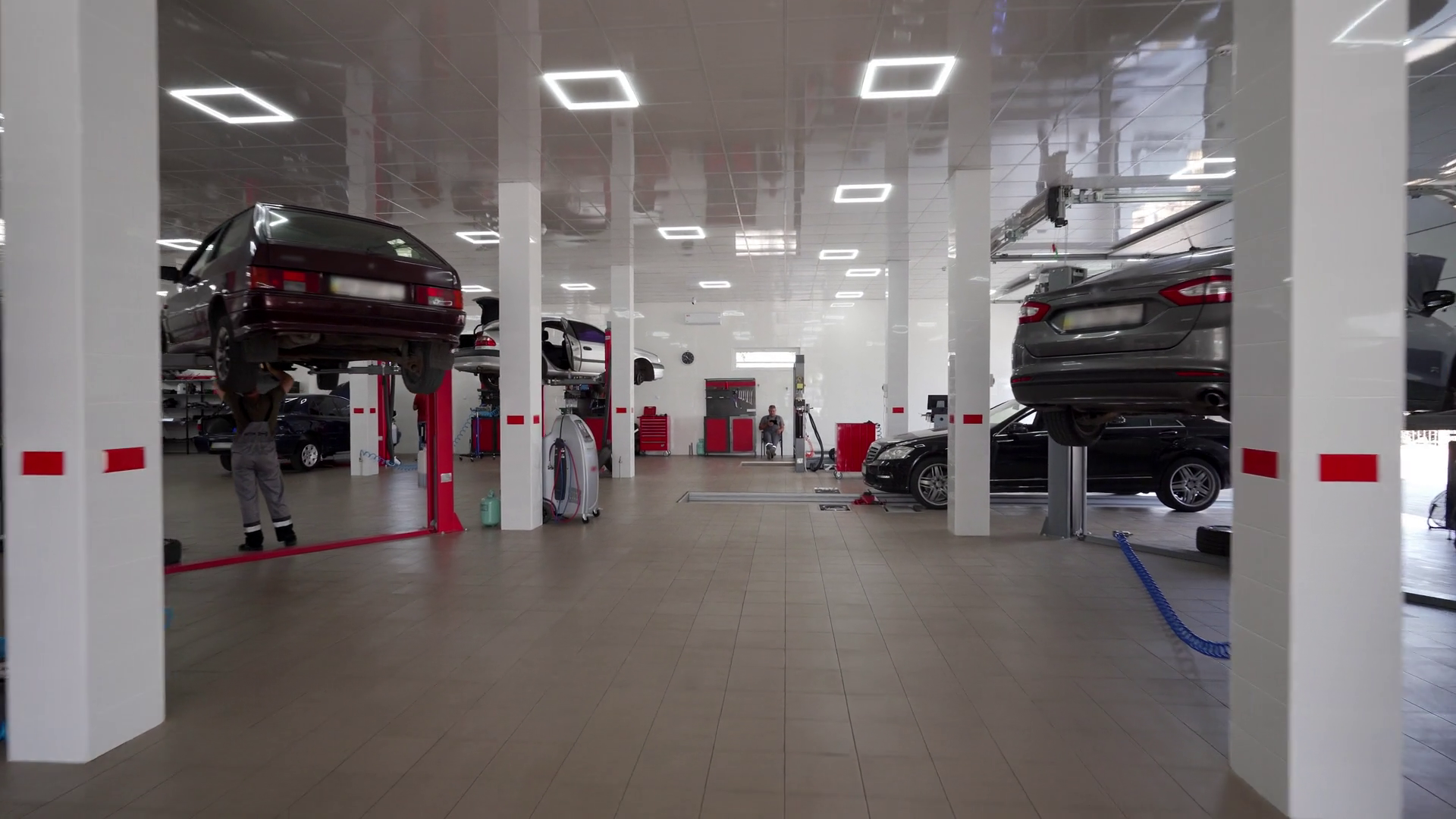 Modern Car Service Center With Vehicles On Stock Footage SBV-348913067 ...