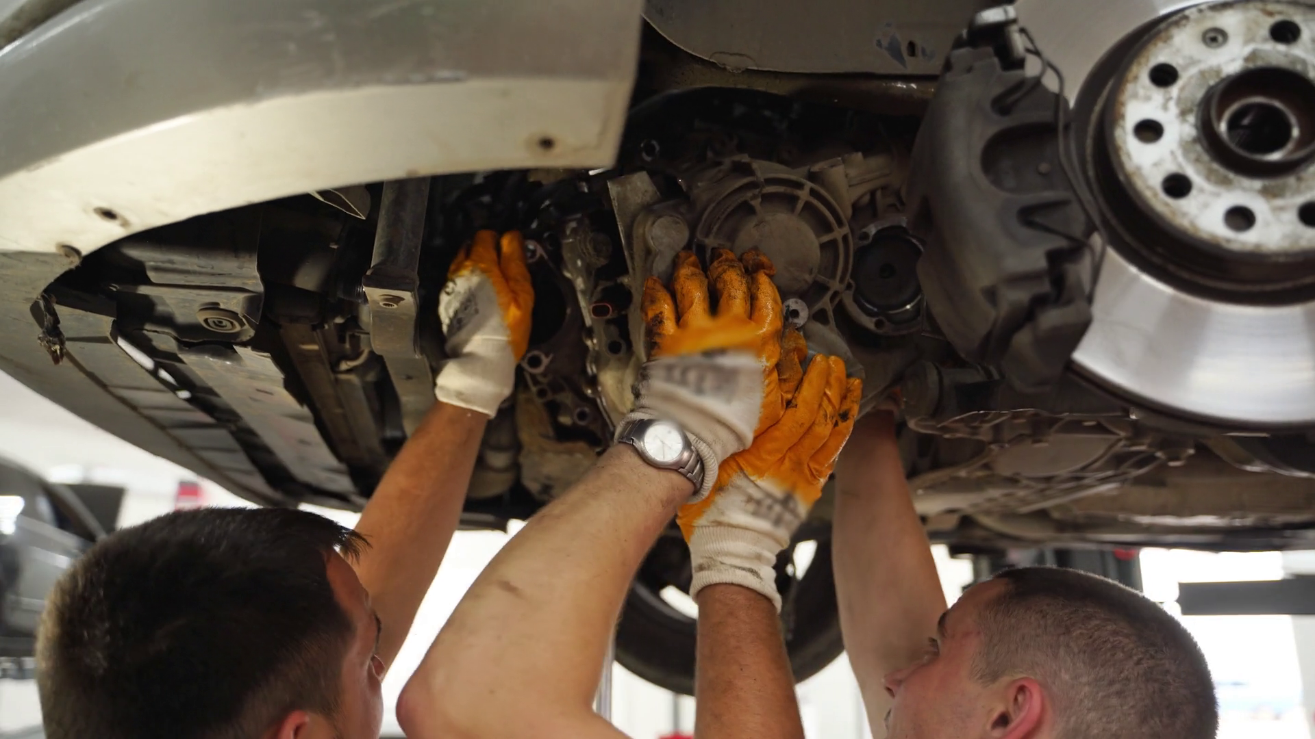 Auto Mechanics Work Under Vehicle Perform Stock Footage SBV-348819982 ...