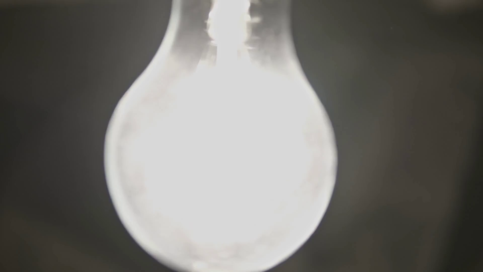Close Up Of Light Bulb Turns On Off Footage Stock Footage SBV-349062351 ...