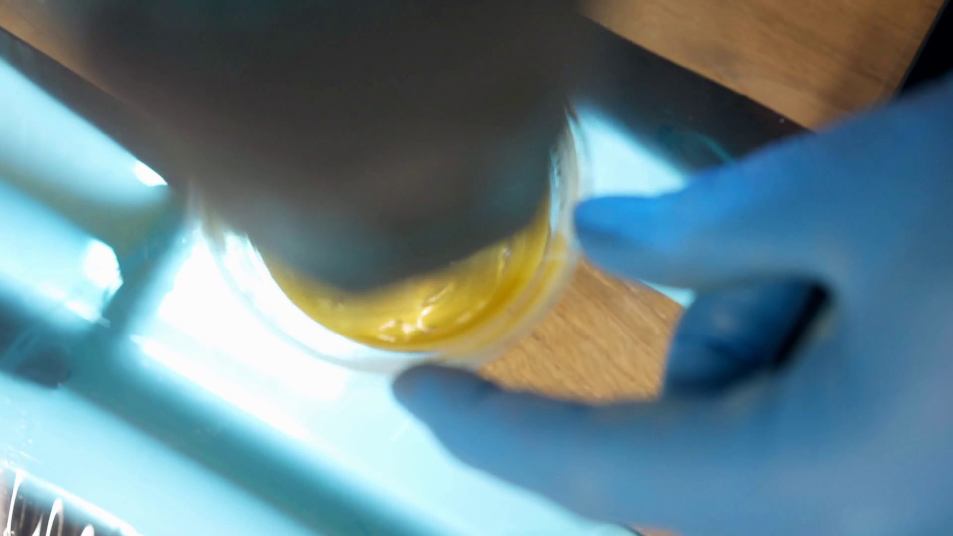 Dense Yellow Solution Mixing In Plastic Cup Stock Footage SBV-348861452 ...