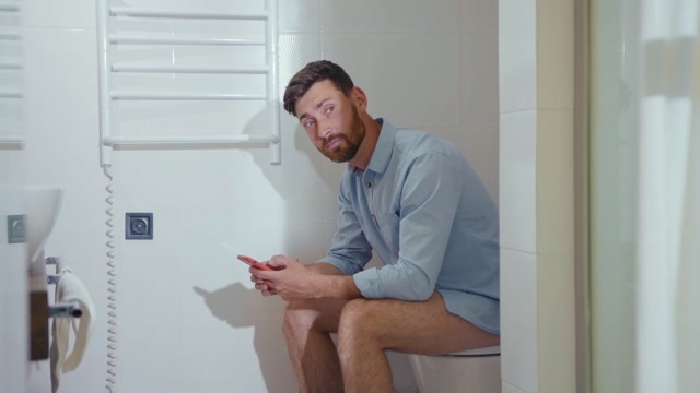 Sitting In Toilet Stock Footage: Royalty-Free Video Clips - Storyblocks