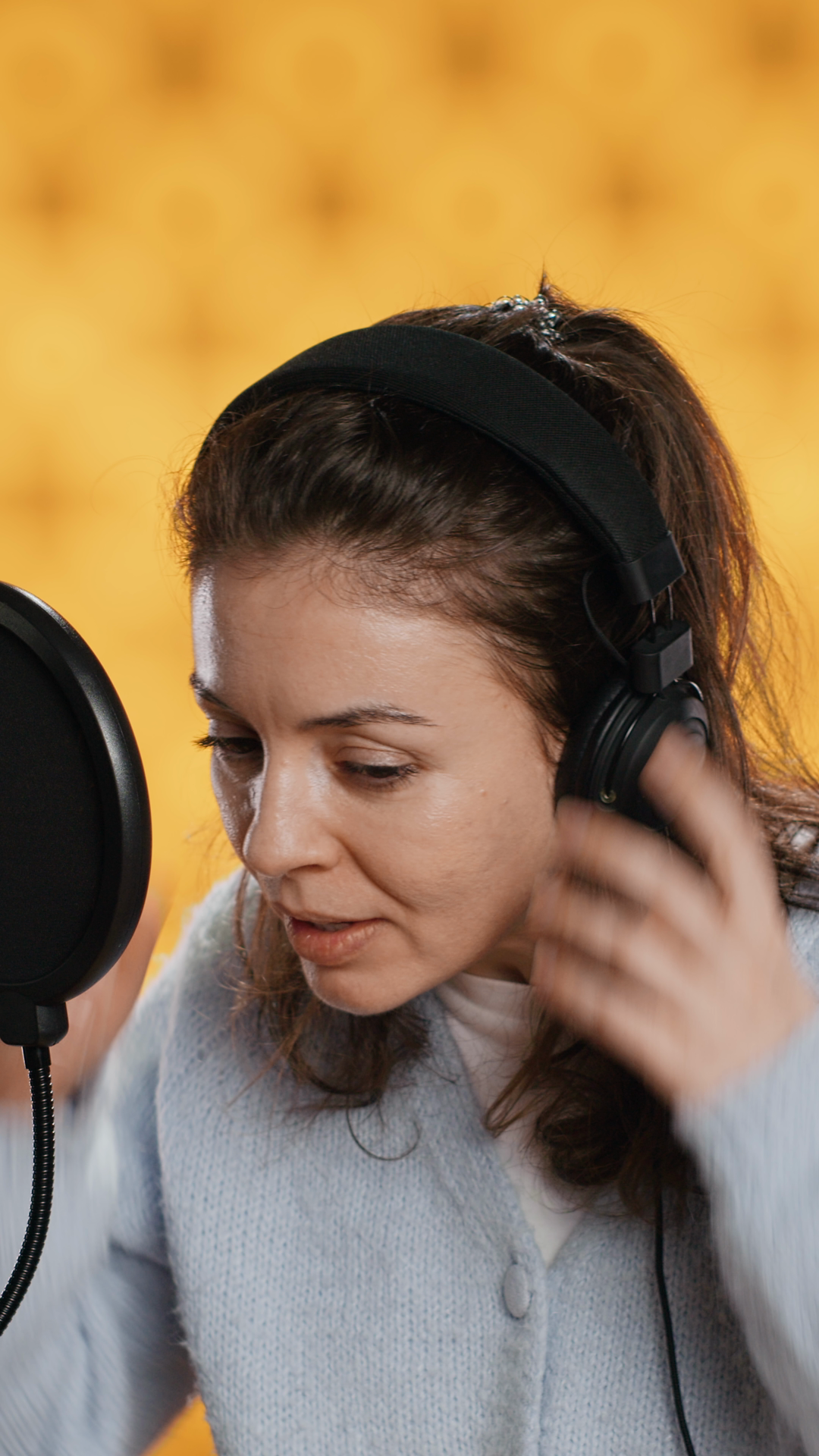 Vertical Video Narrator Wearing Headphones Stock Footage SBV-353452483 ...