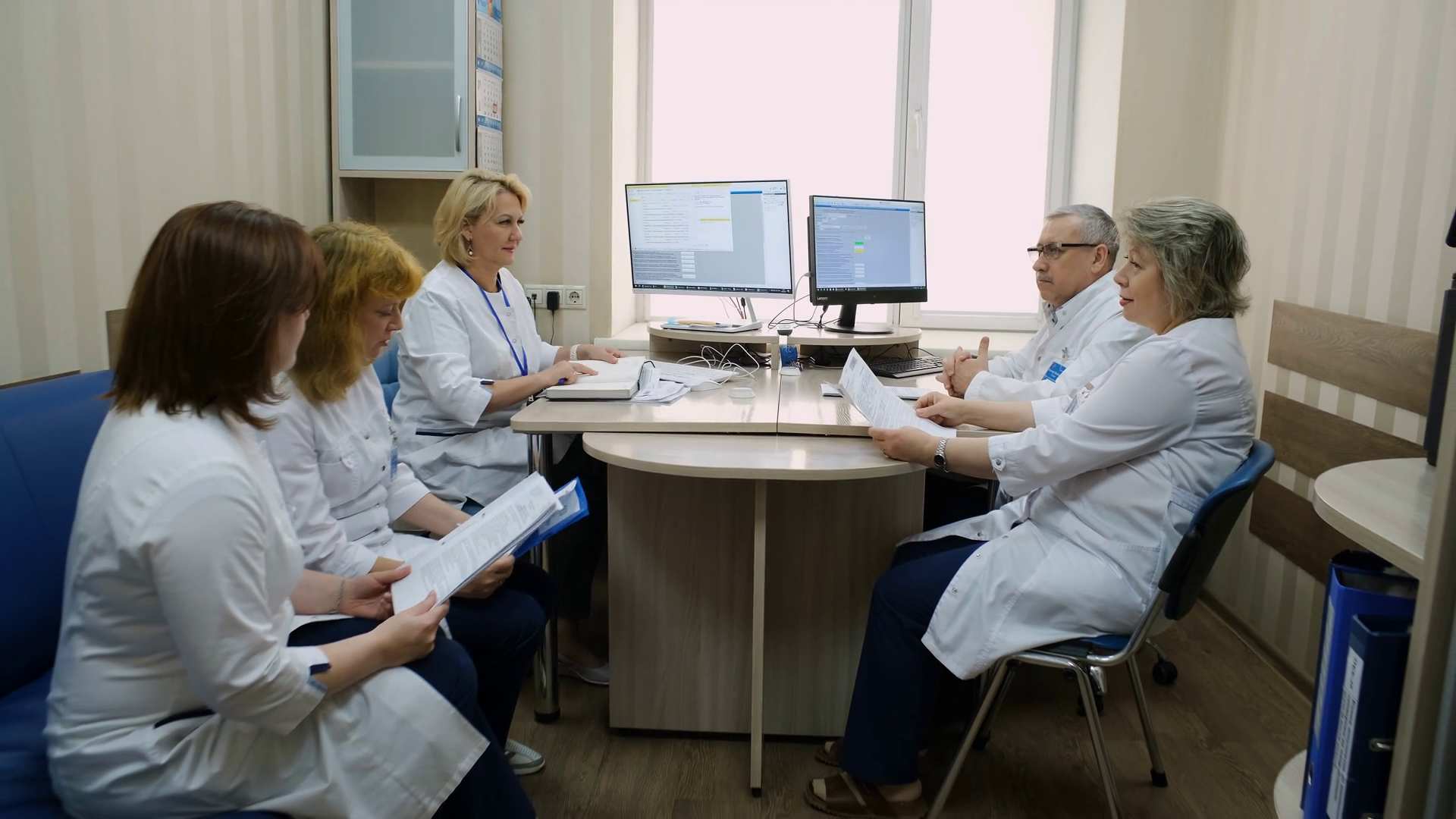 A Team Of Doctors During Consultation In Stock Footage SBV-348459967 ...