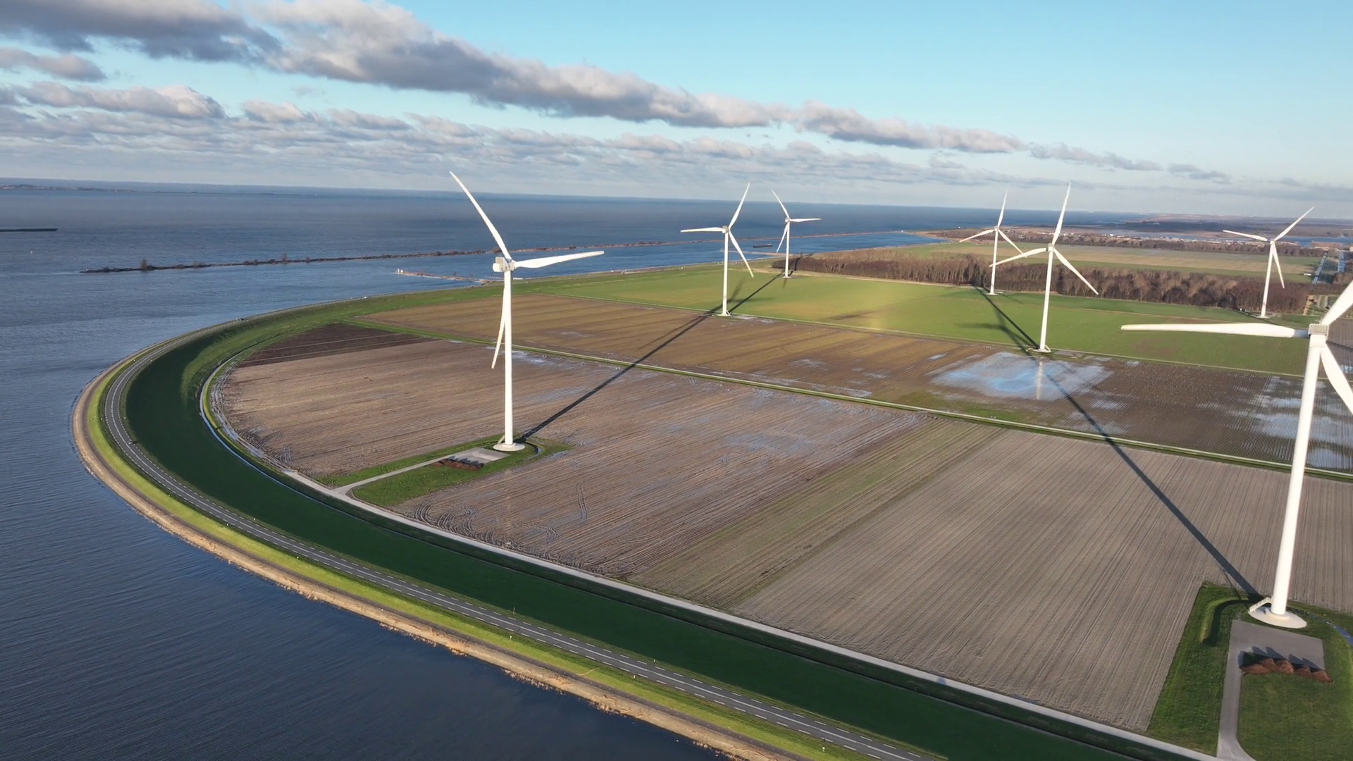 Rural Area Along Water Line Wind Turbines Stock Footage SBV-348810899 ...