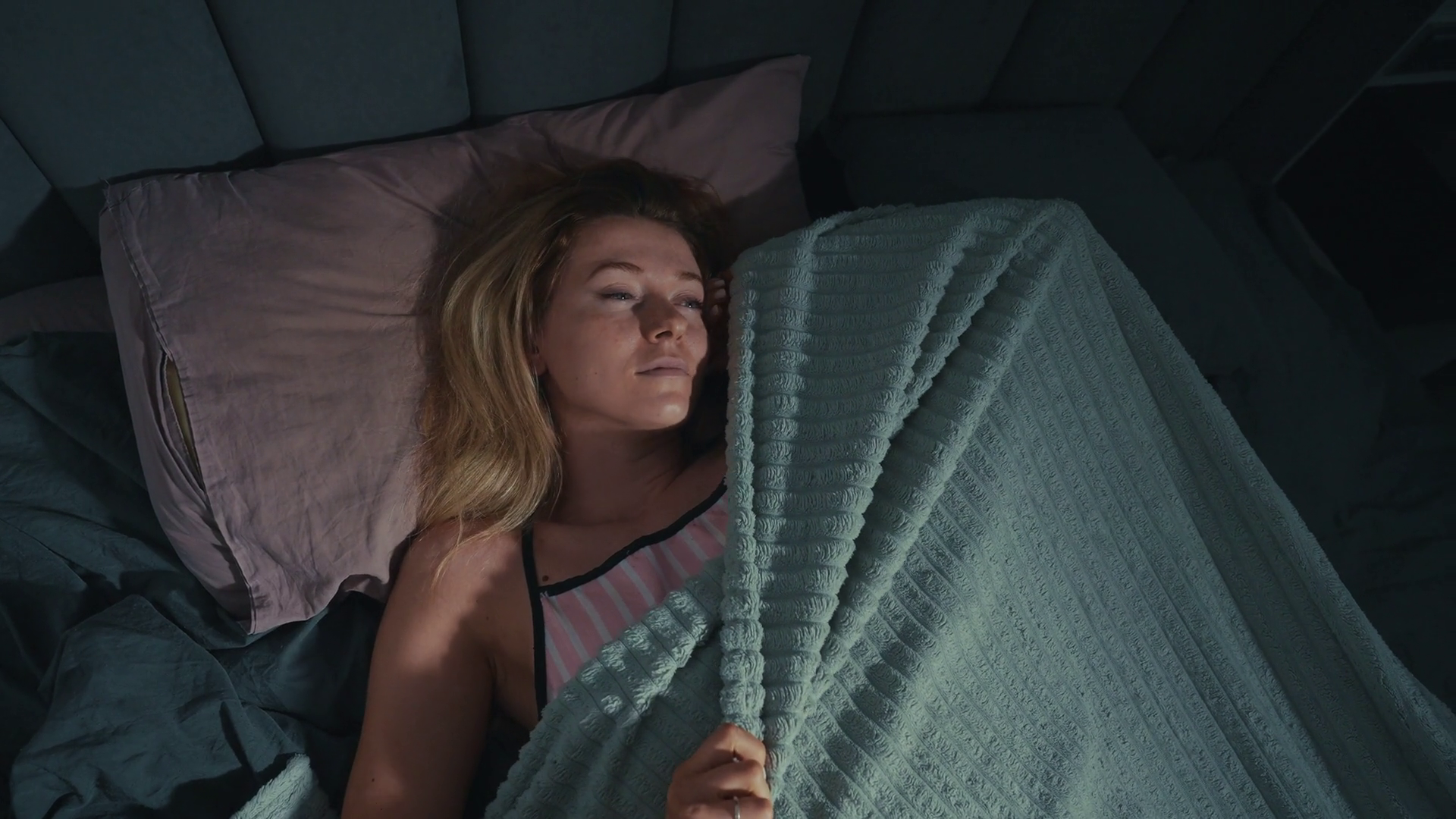 Person Hiding Under Blanket In Dimly Lit Stock Footage SBV-349206676 ...