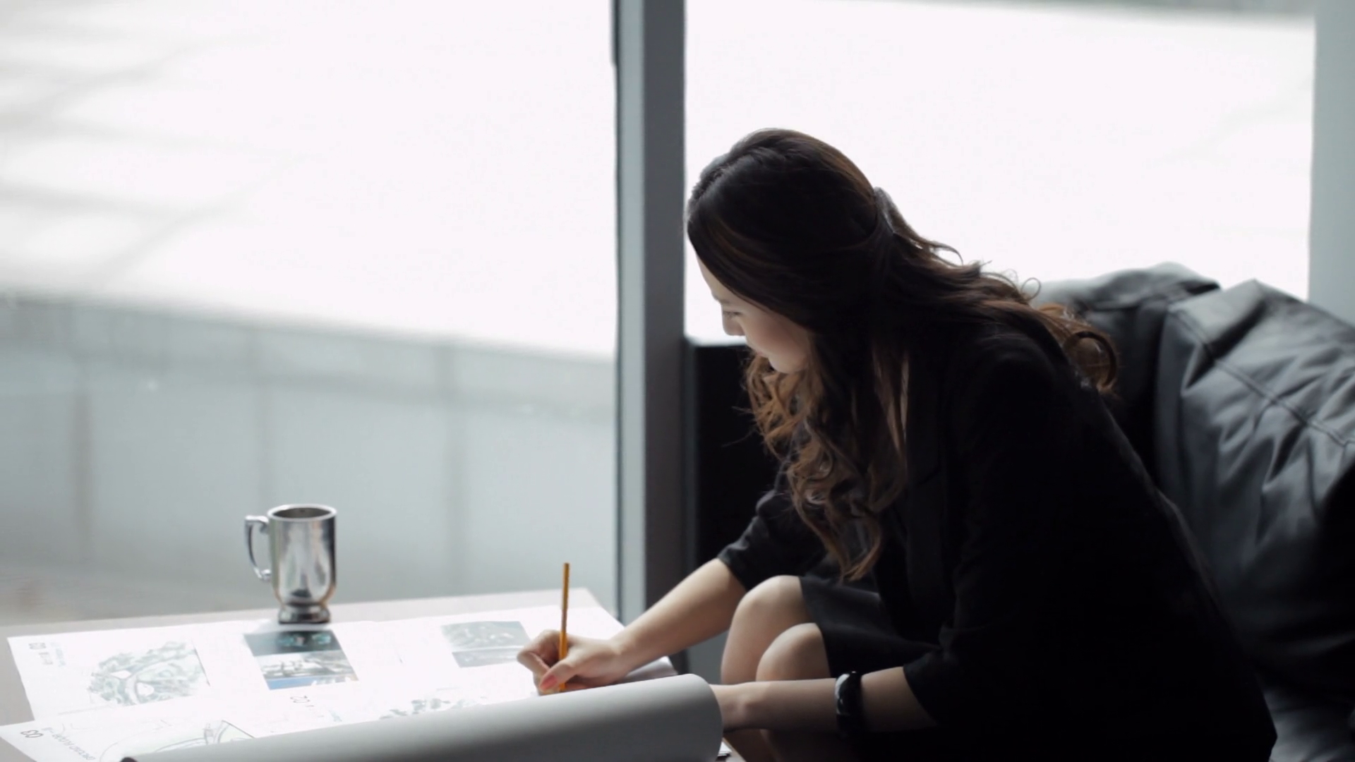 Young Professional Writing At Coffee Table Stock Footage SBV-311358764 ...