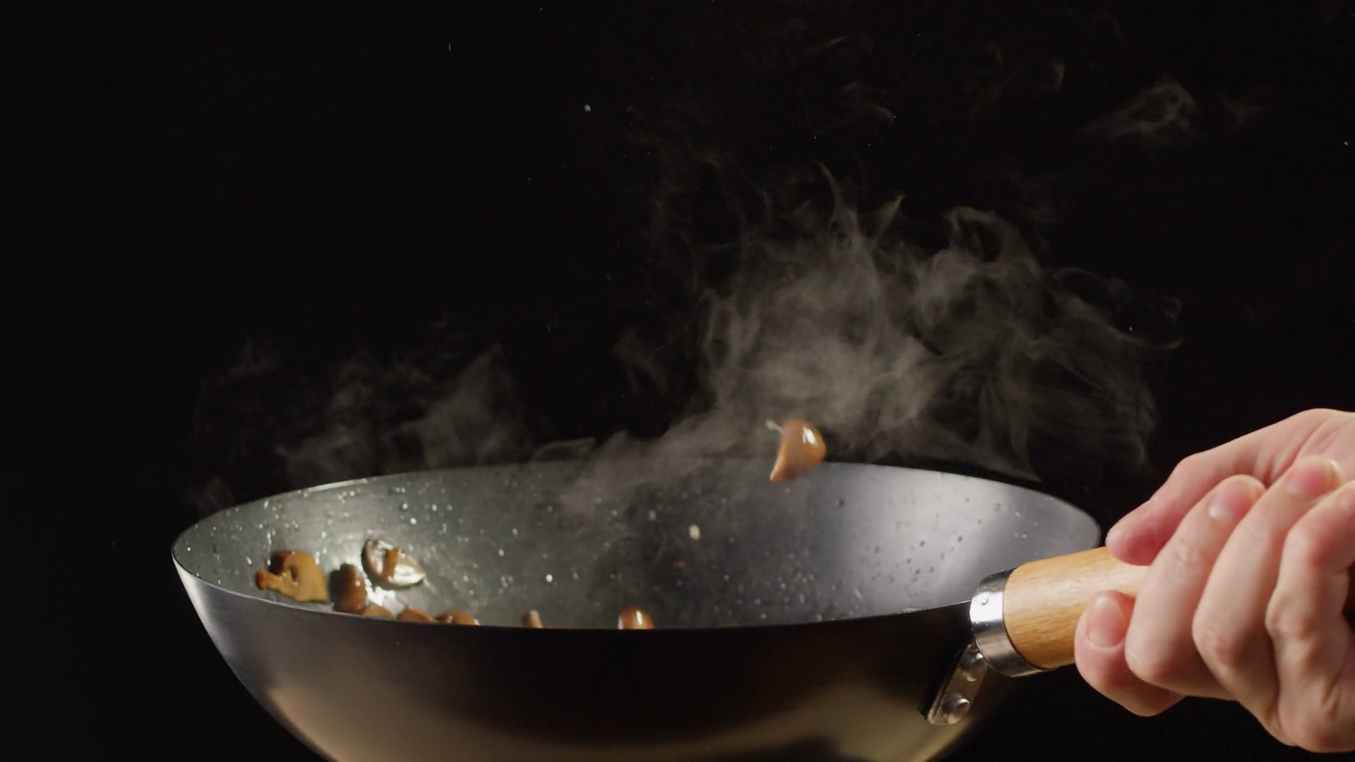 Chef Cooking Mushrooms In Wok Close Up Stock Footage SBV-348829644 ...