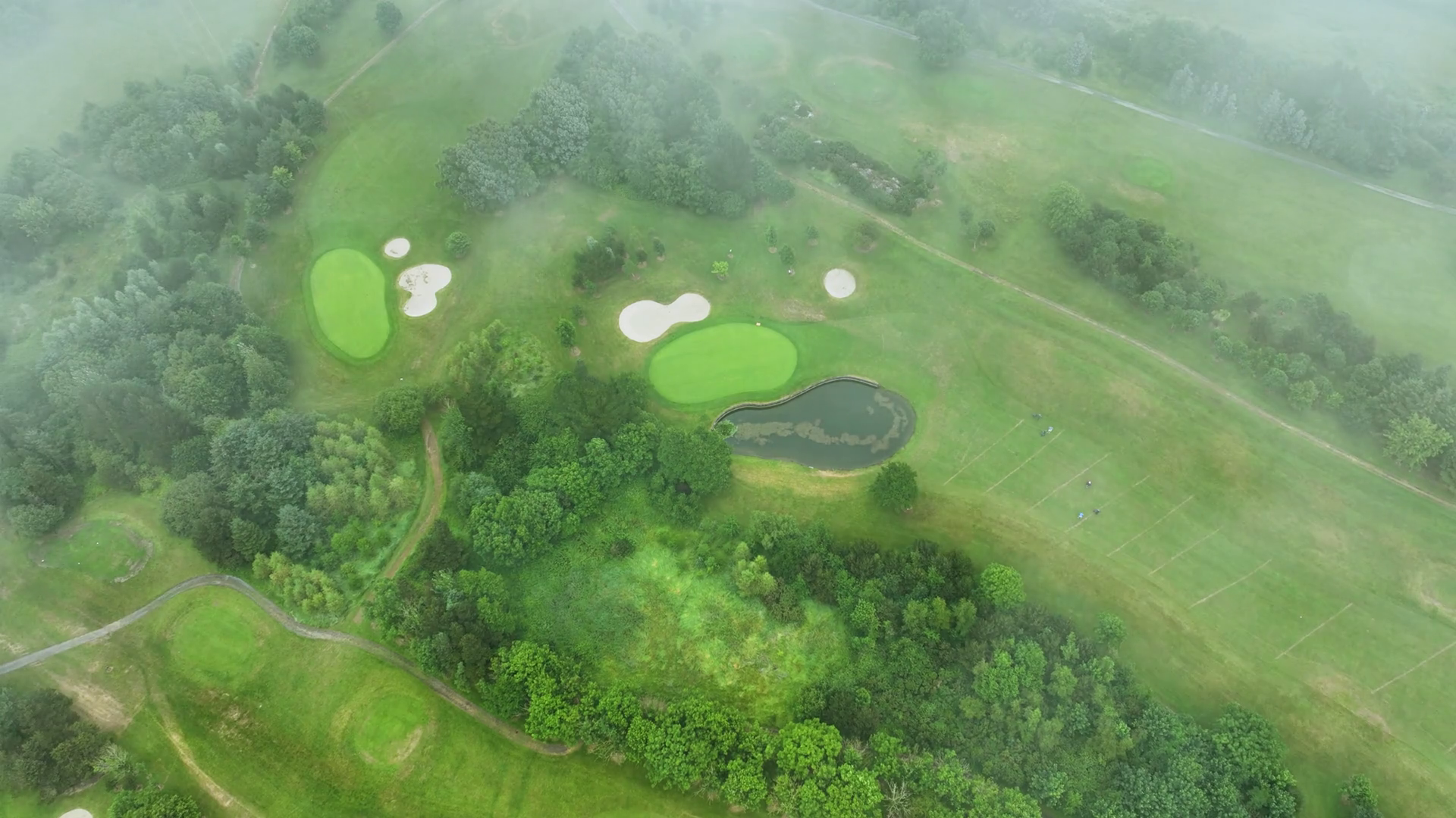 Flying Over Misty Golf Club Beautiful Golf Stock Footage SBV-348490444 ...