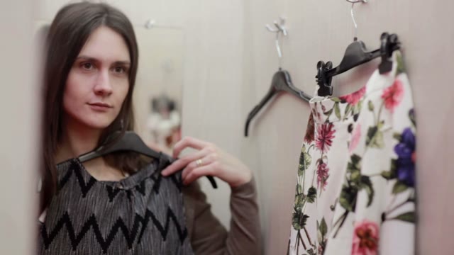 Changing Clothes Stock Footage: Royalty-Free Video Clips - Page 2 - Storyblocks