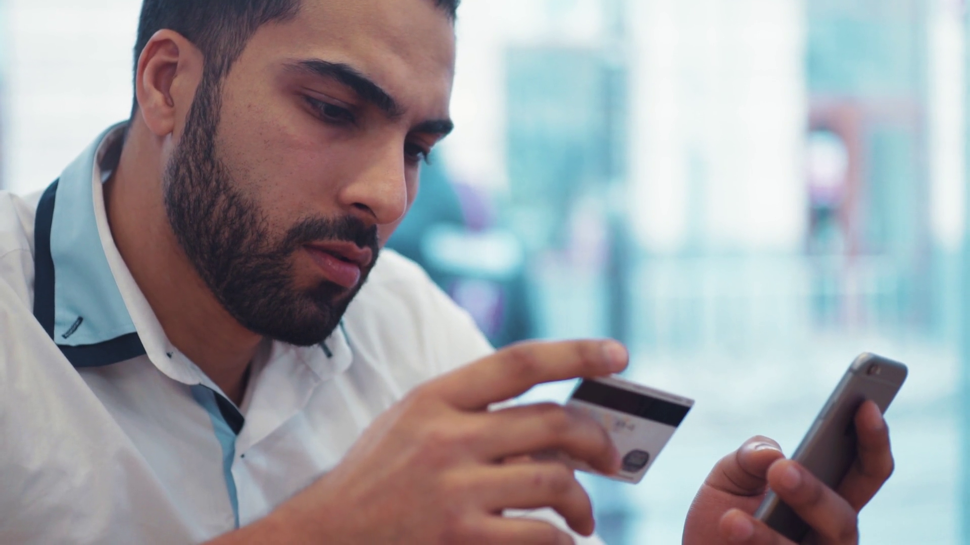 Young Man In Café Using Phone Credit Cards Stock Footage SBV-313772390 ...