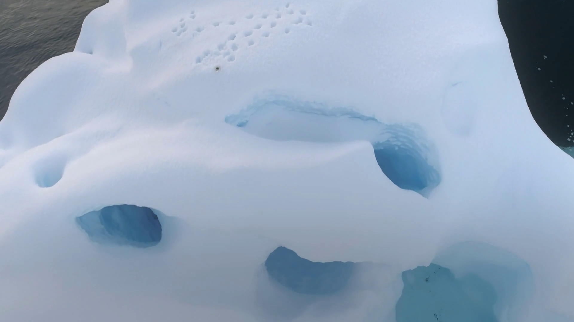 Melting Ice Effects On Hollow Iceberg Drone Stock Footage SBV-348391568 ...