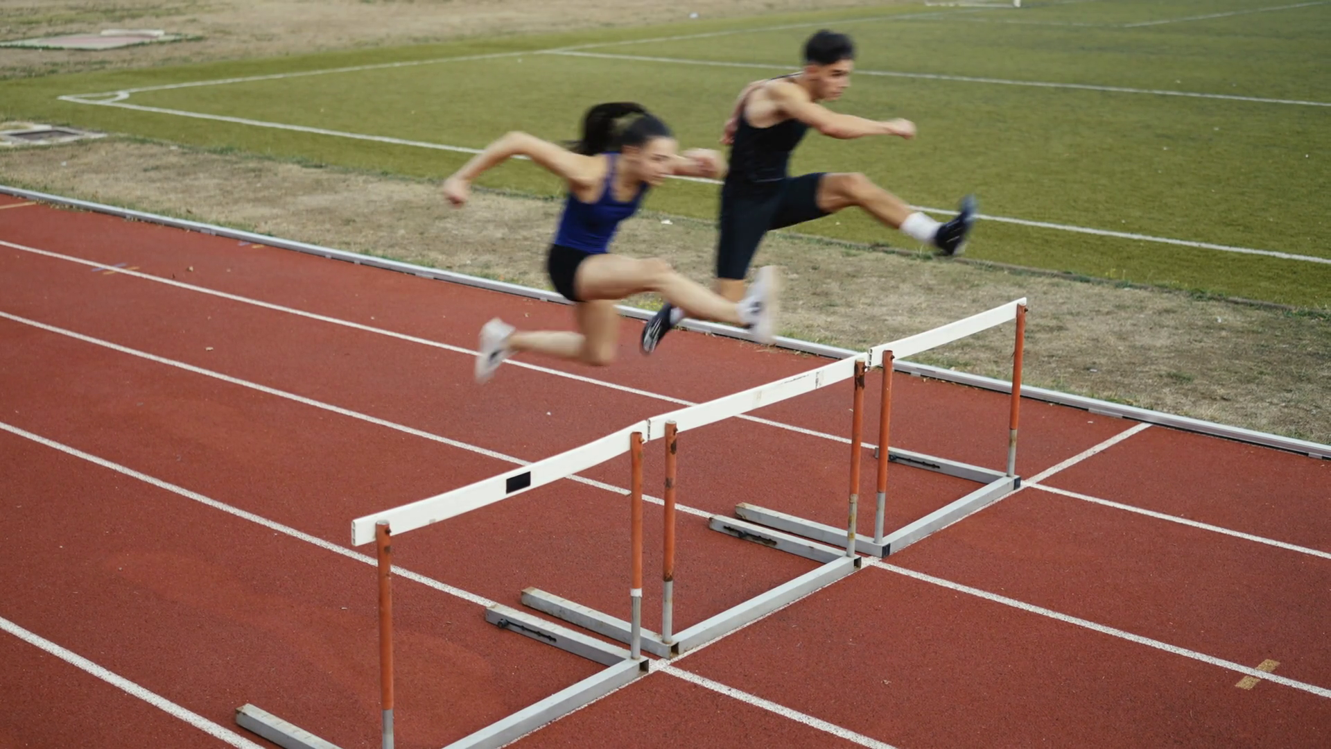 Athletic Fit Couple Man Woman Hurdling In Stock Footage SBV-349393658 ...