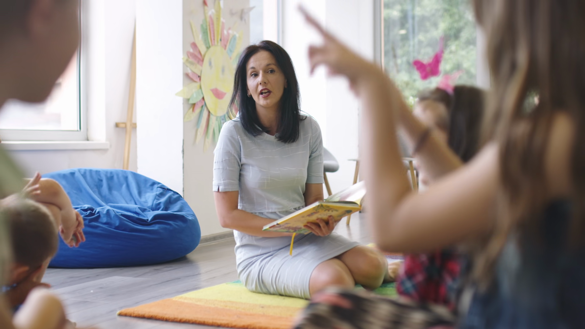 A Caring Teacher Reads To Enthusiastic Child Stock Footage SBV ...