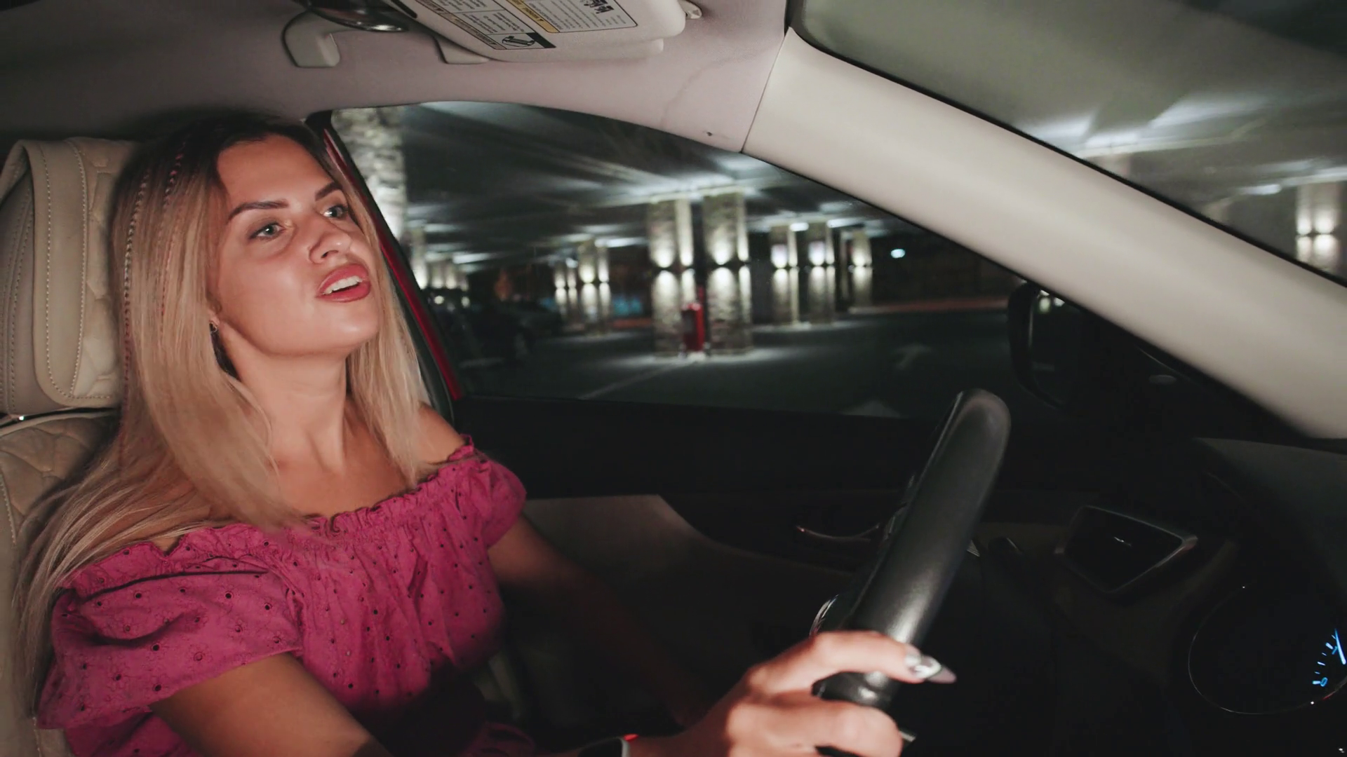 A Blonde Woman Happily Drives Car Through Stock Footage SBV-351741464 ...