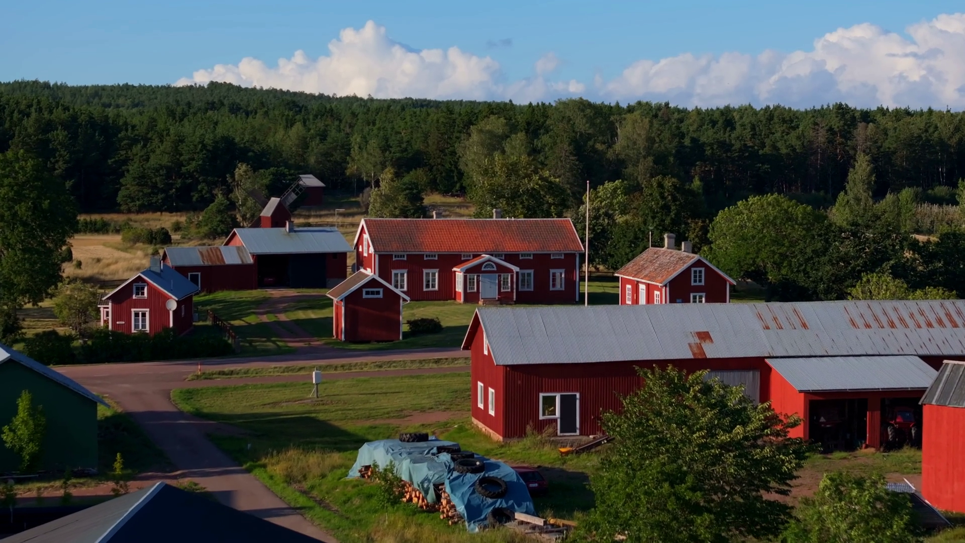 Red Wooden Farm Structures Nestled Among Stock Footage SBV-349313531 ...