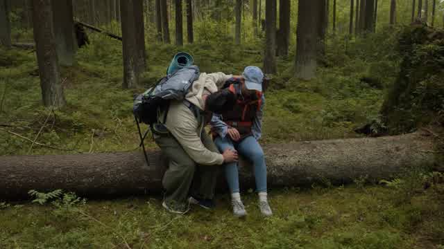 Man Helping Injured Woman Stock Footage: Royalty-Free Video Clips ...