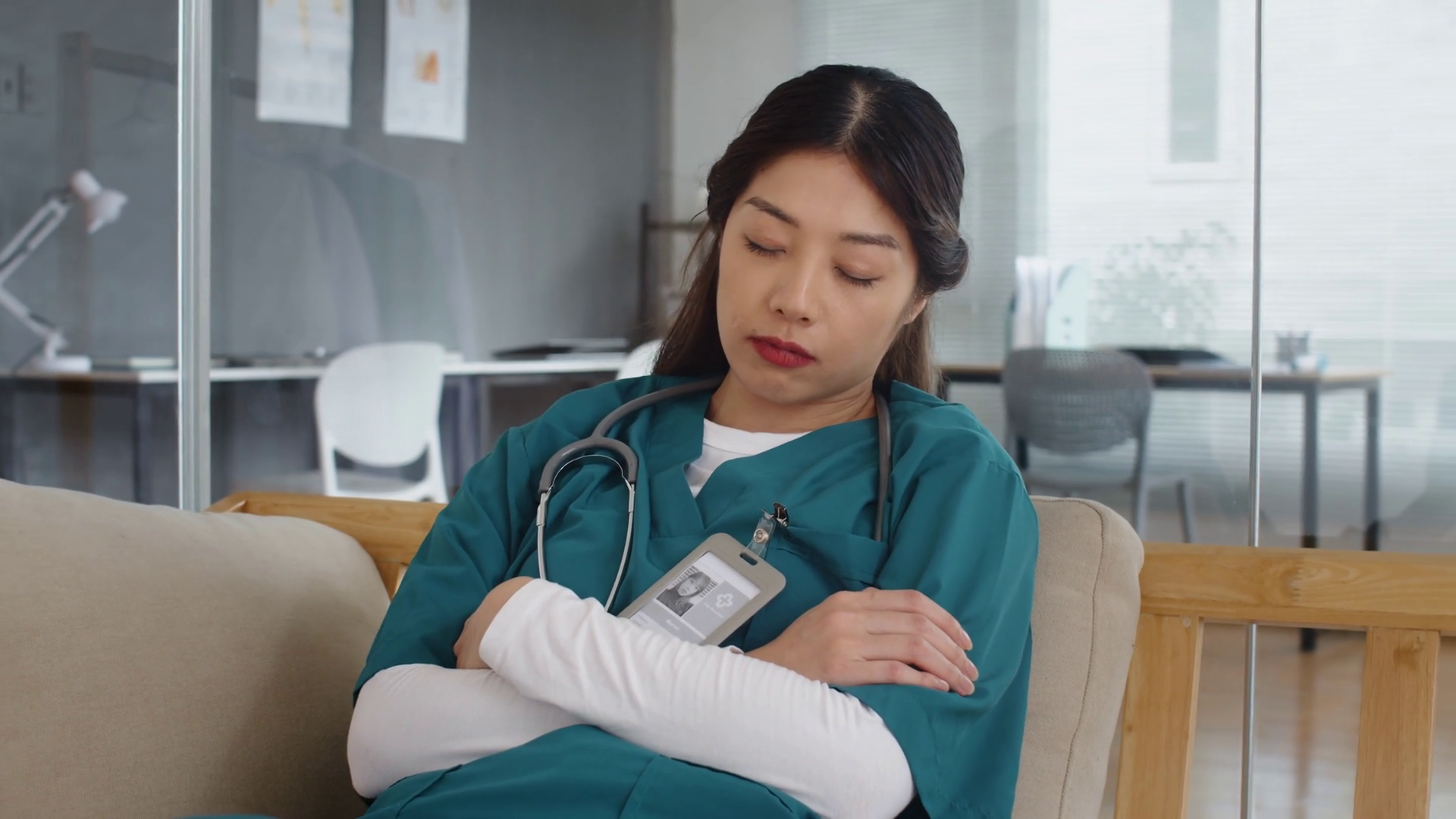 Tilt Up Shot Of Tired Asian Nurse Sleeping Stock Footage SBV-353072101 ...