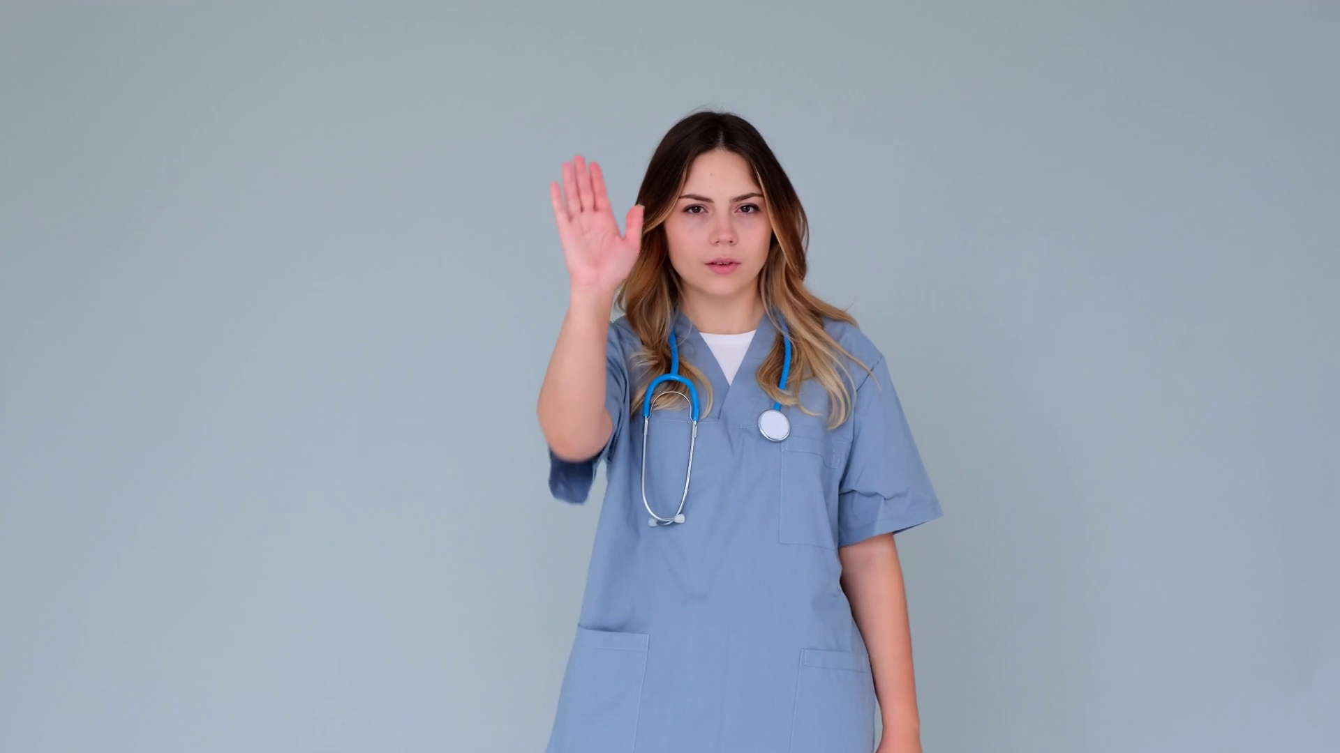 Concentrated Doctor Nurse Showing Stop Sign Stock Footage SBV-349310691 ...