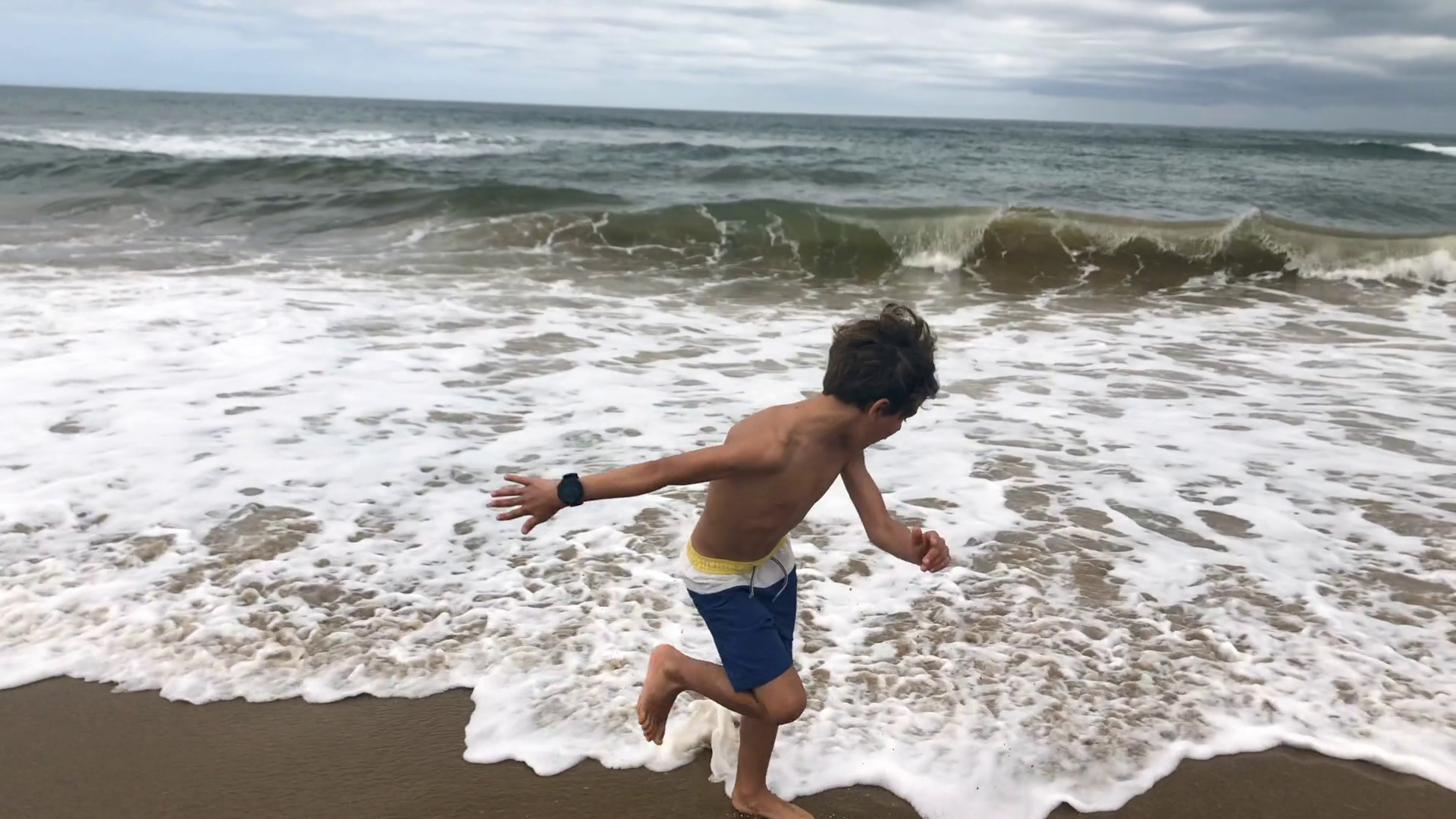 Boy Backing Out From Sea Shore Water Afraid Stock Footage SBV-349098021 ...