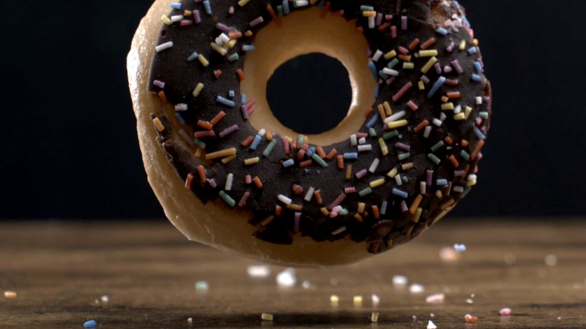 Chocolate Donut Descending Onto Table Stock Footage SBV-351798488 ...