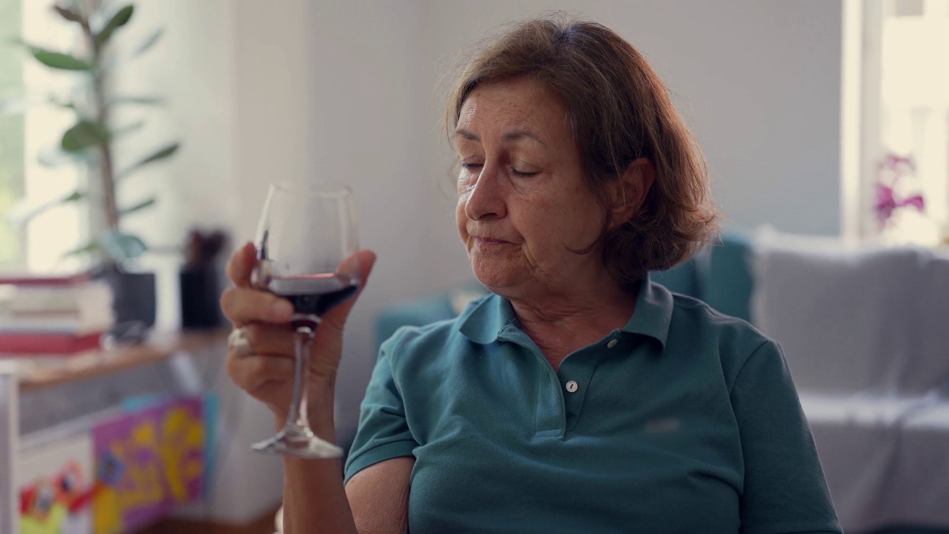 Elderly Woman Holding Glass Of Red Wine Stock Footage SBV-349202254 ...