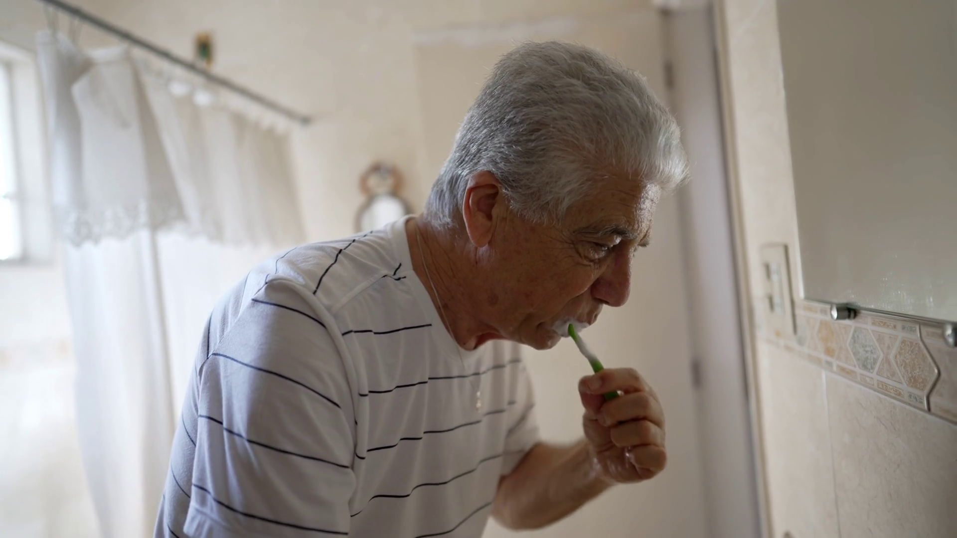 Morning Ritual: Senior Gentleman's Face Care Stock Footage SBV ...