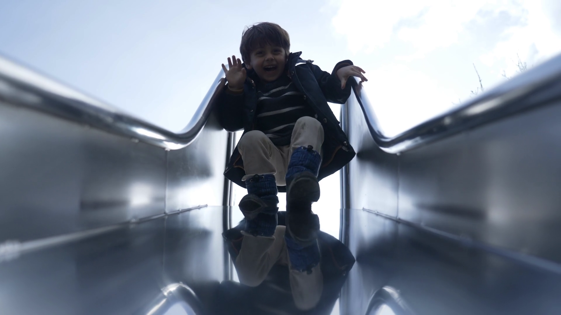 Joyful Child Sliding Down Slider At Stock Footage SBV-348936546 ...