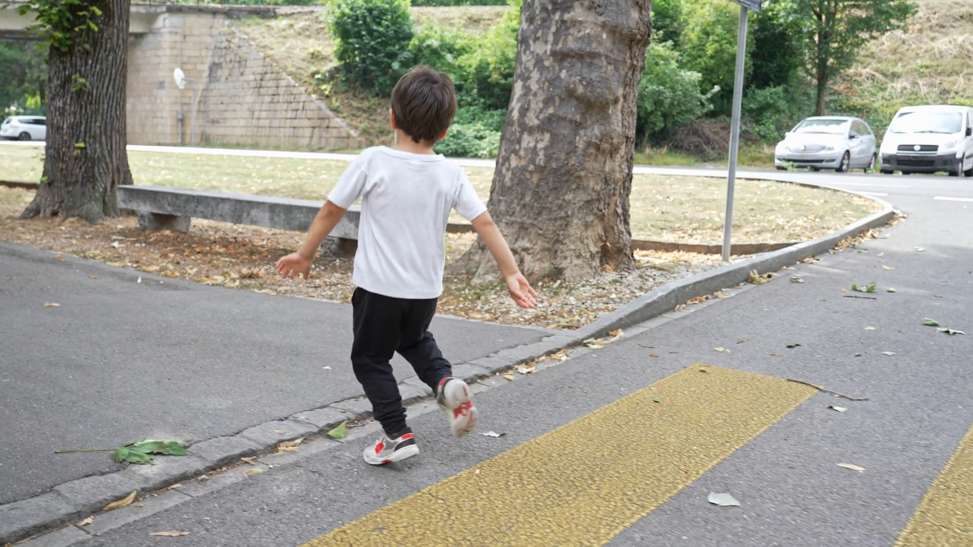 Joyful Little Boy Skipping On Crosswalk Stock Footage SBV-348920622 ...