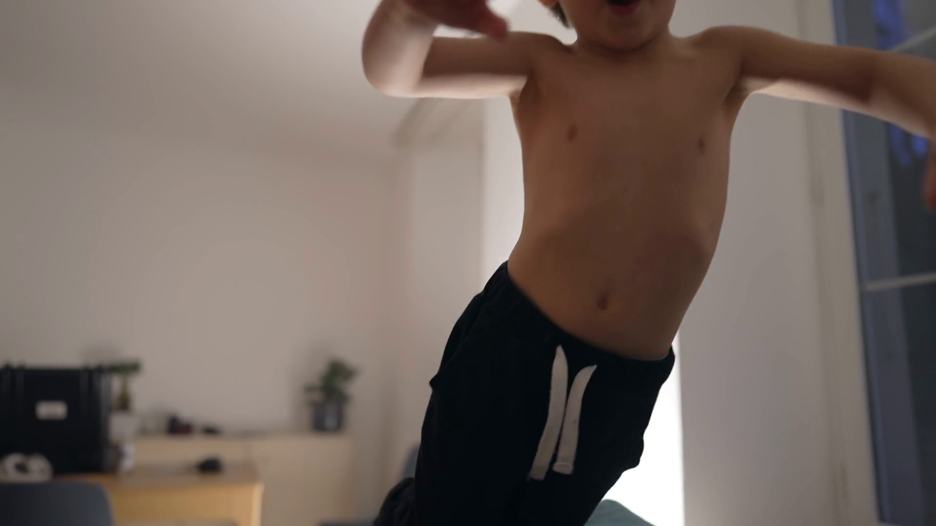 Active Child Jumping On Couch At Home In Stock Footage SBV-348939666 ...