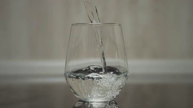 Water Pouring Glass Slow Motion Stock Footage: Royalty-Free Video Clips ...