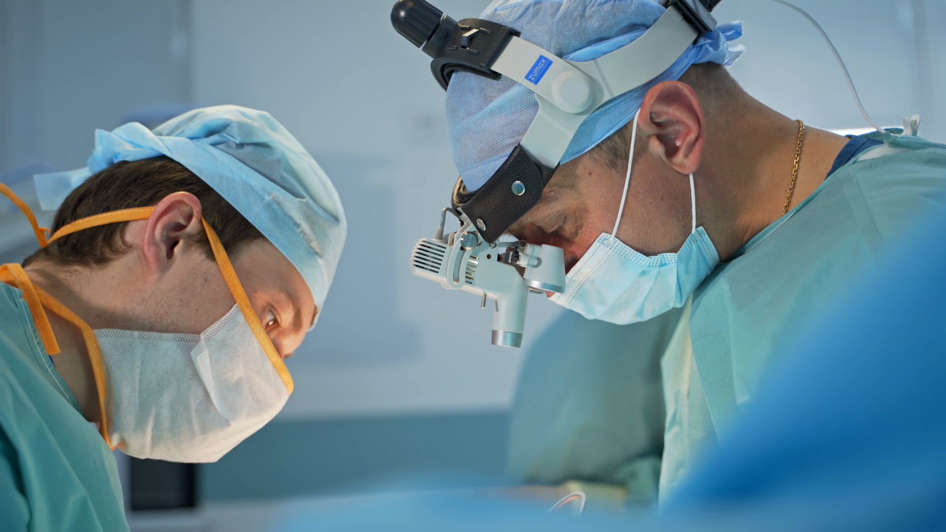 Two Male Surgeons Bent Over Patient Chief Stock Footage SBV-353592196 ...