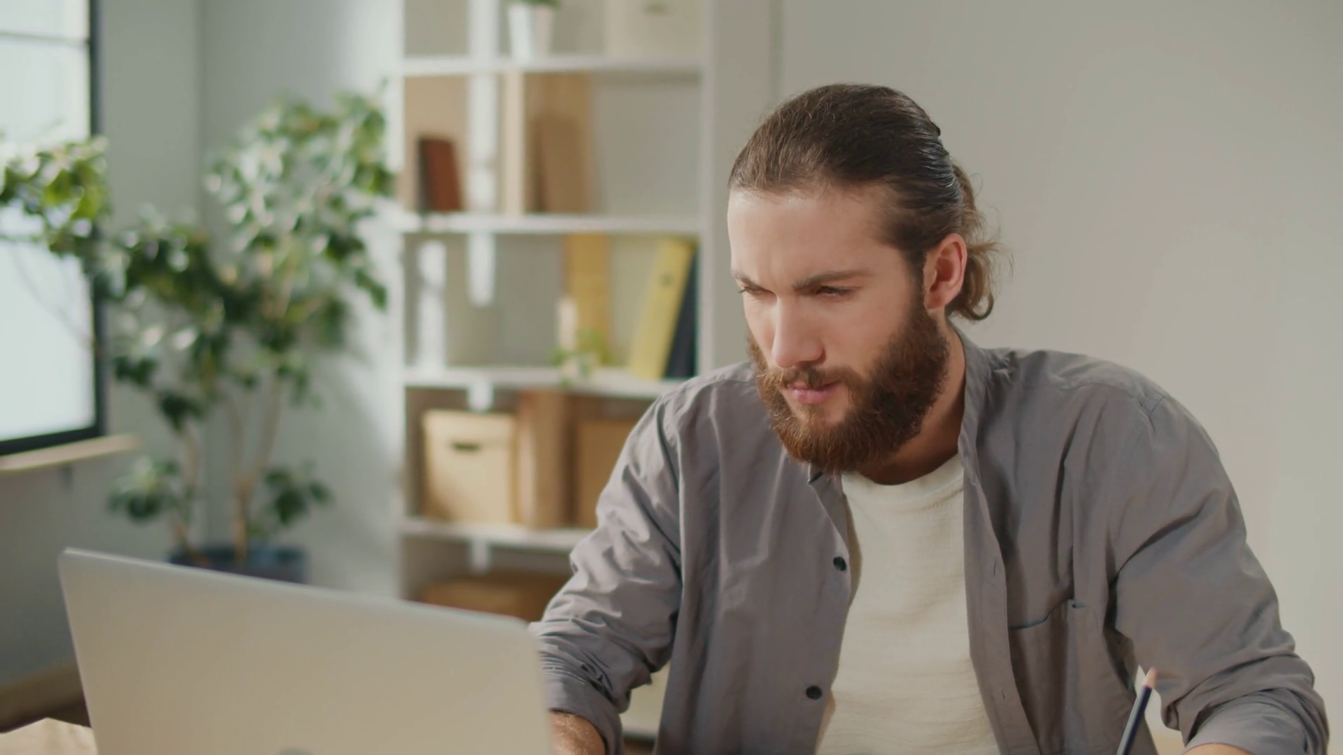 Portrait Of Focused Man Working On Laptop Stock Footage SBV-348829637 ...