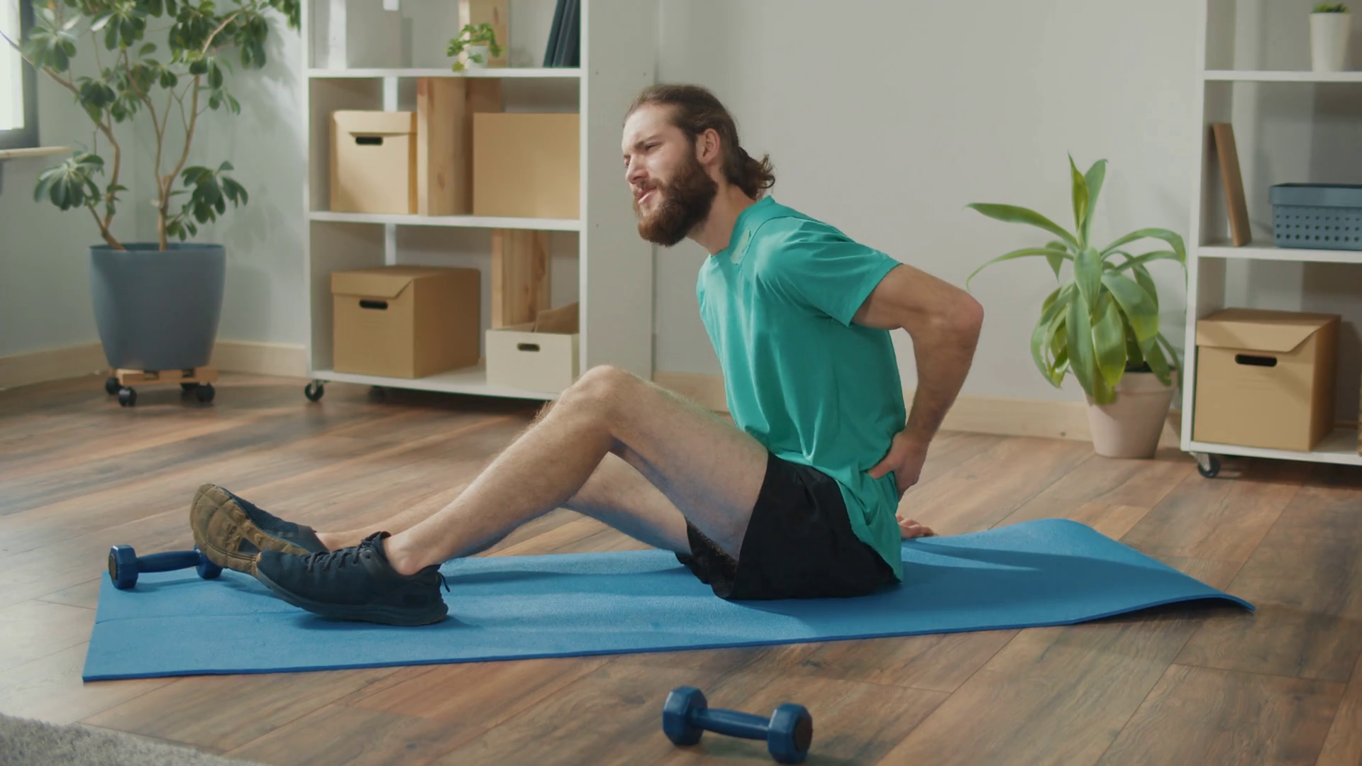 Young Man Sits On Floor At Home Got Injured Stock Footage SBV-348829955 ...