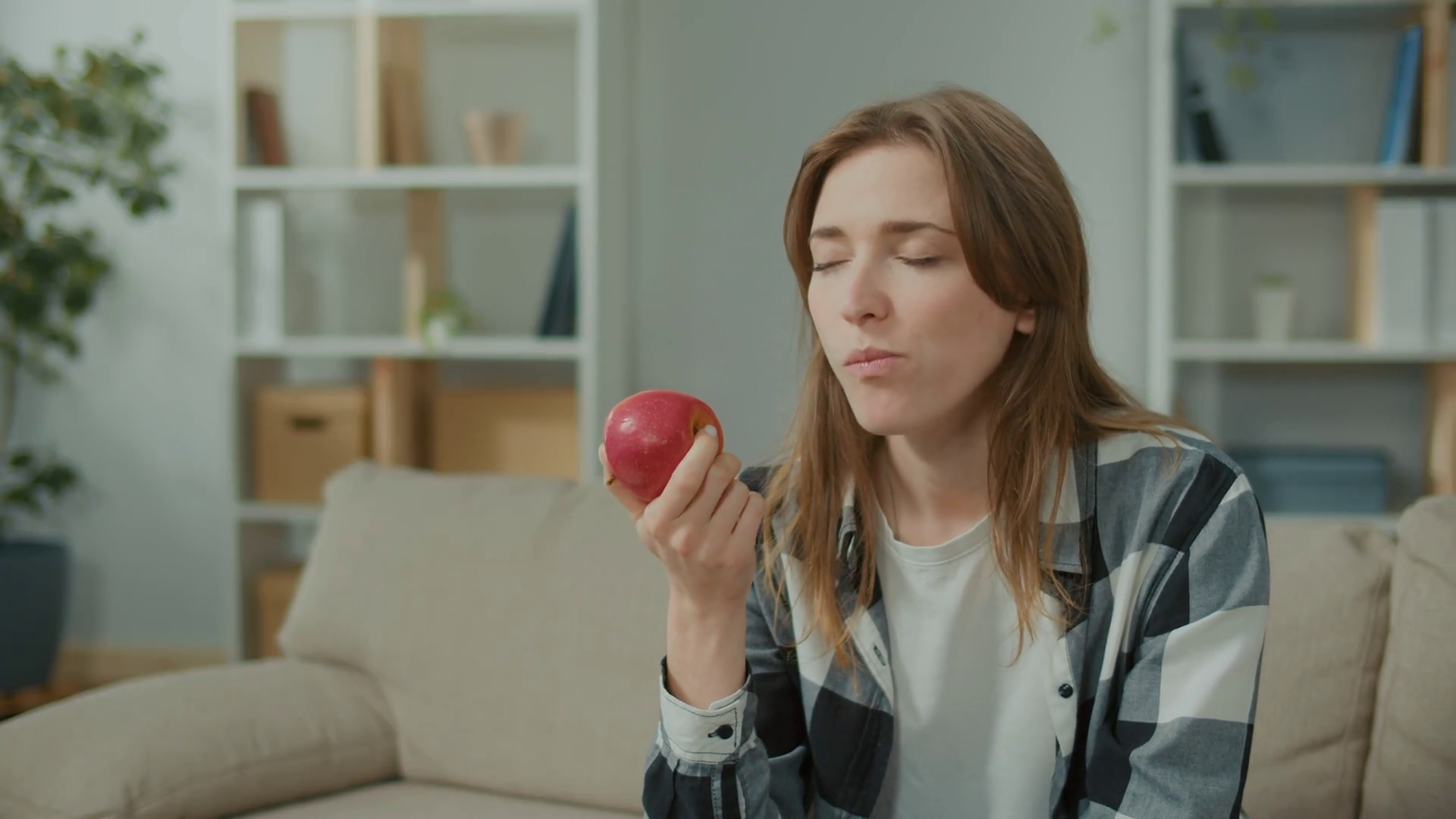 Young Woman Eating Apple Suddenly Feeling Stock Footage SBV-348828033 ...