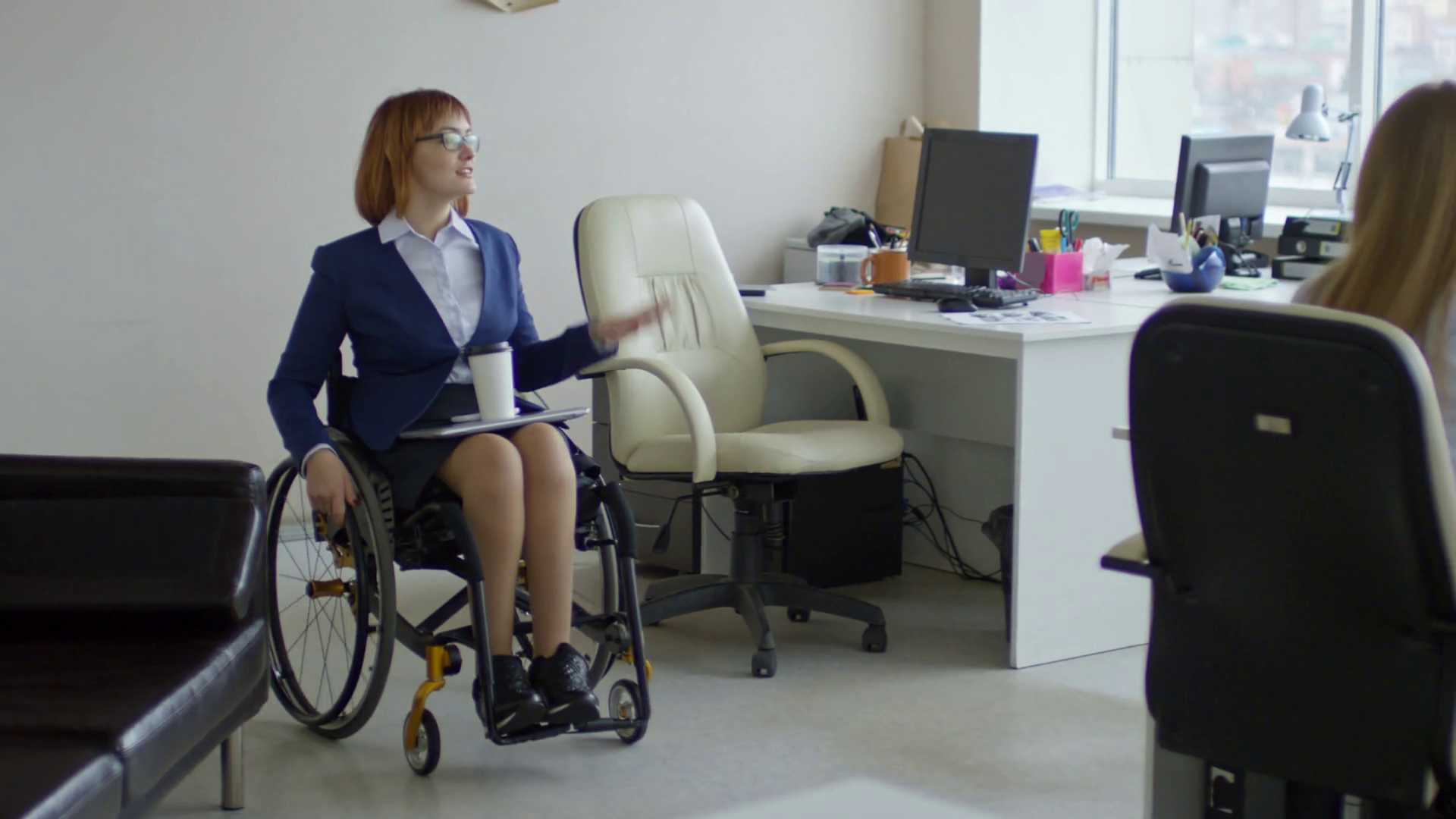 Smiling Businesswoman In Wheelchair Riding Stock Footage SBV