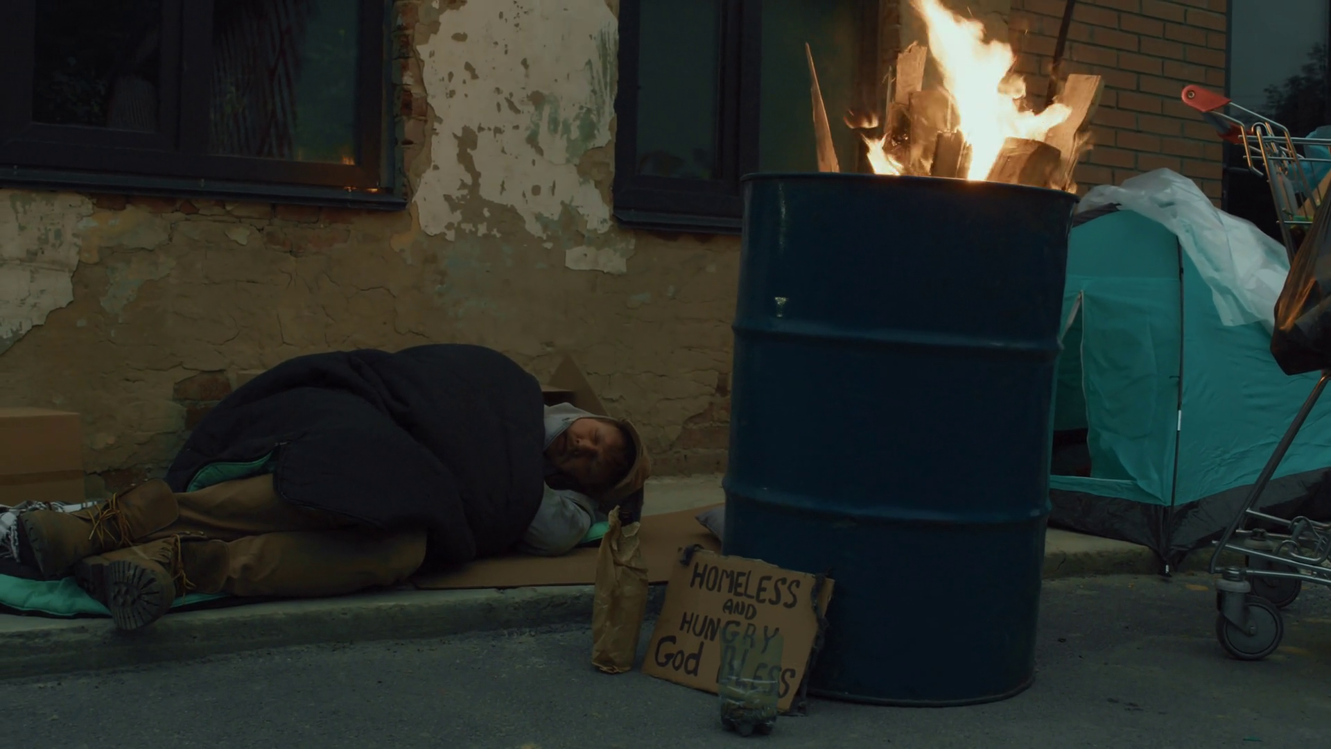 Long Shot Of Tramp Sleeping On Cardboard Stock Footage SBV-348376390 ...