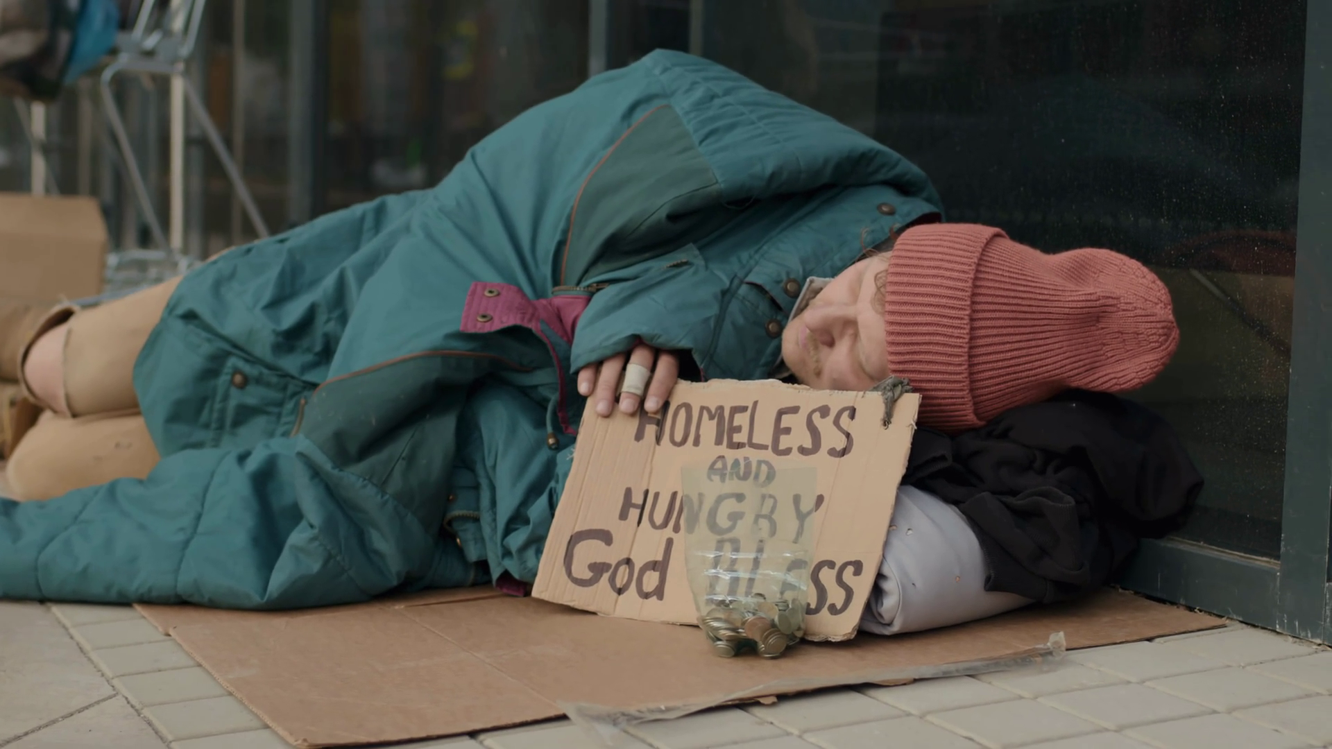 Medium Shot Of Sleeping Tramp In Rags Laying Stock Footage SBV ...
