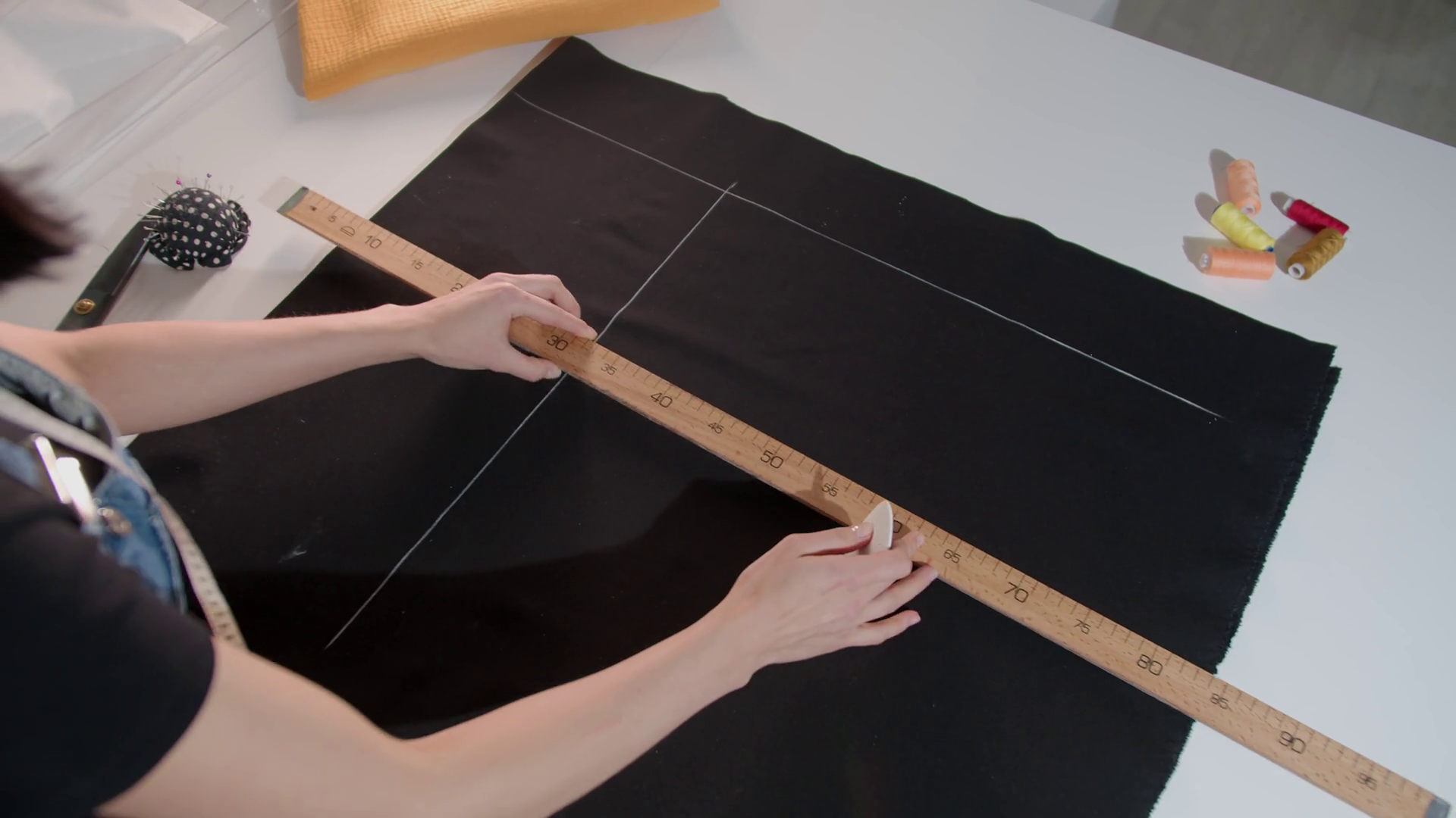 A Woman's Hands Is Measuring Piece Of Fabric Stock Footage SBV ...